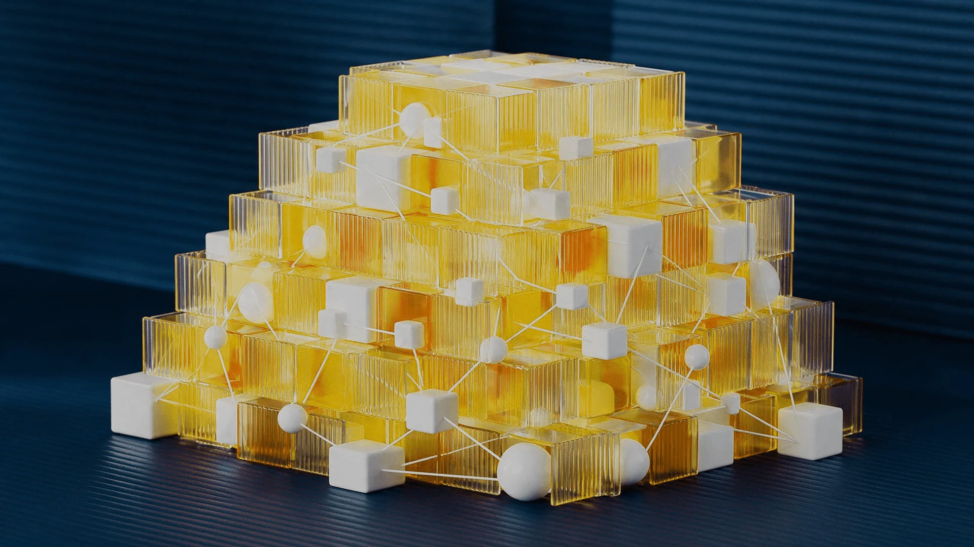 Pyramid of yellow glass cubes with white nodes linked in a network
